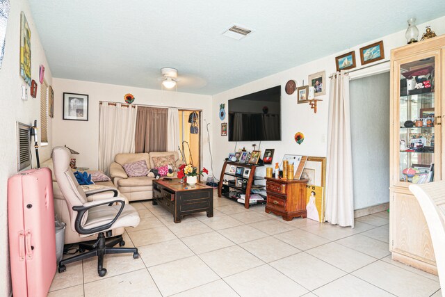 3208 Prince Dr, Lake Worth, FL 33461 - living area with light tile patterned floors and visible vents