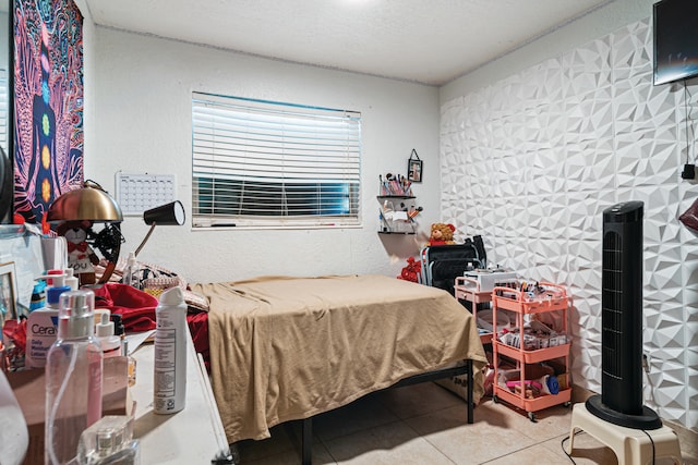 3208 Prince Dr, Lake Worth, FL 33461 - tiled bedroom featuring a textured ceiling
