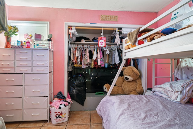 3208 Prince Dr, Lake Worth, FL 33461 - bedroom with a closet and tile patterned flooring