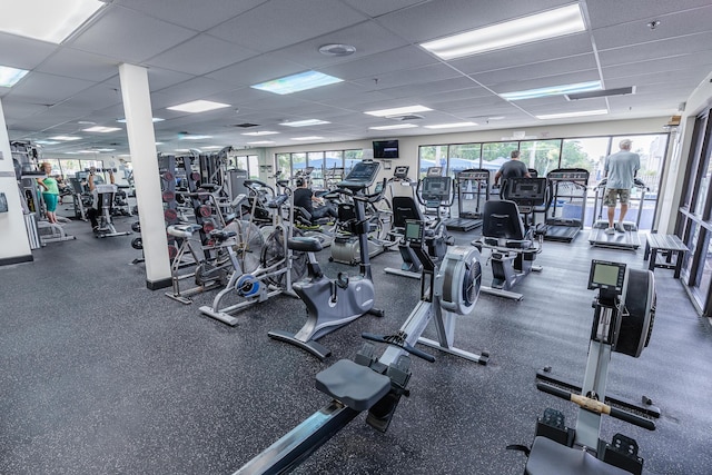 exercise room with a drop ceiling