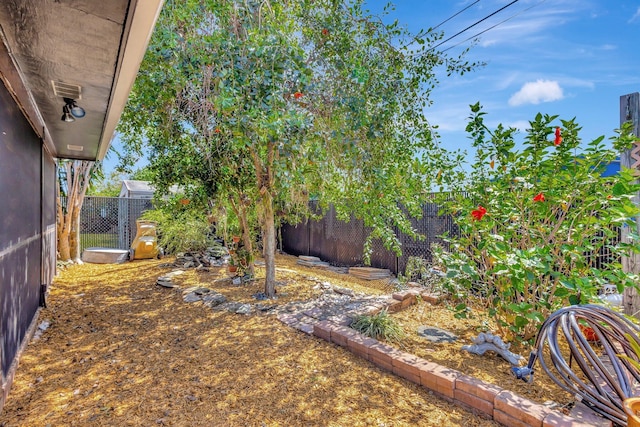 387 Yvonne Dr, West Palm Beach, FL 33406 - view of yard with a patio