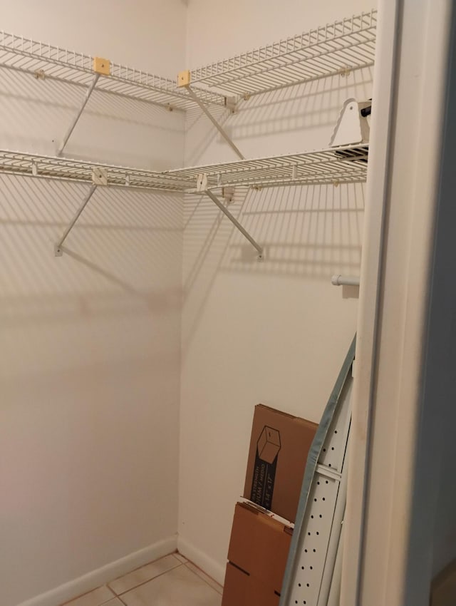 131 Lakes End Dr Unit D, Fort Pierce, FL 34982 - spacious closet with light tile patterned floors
