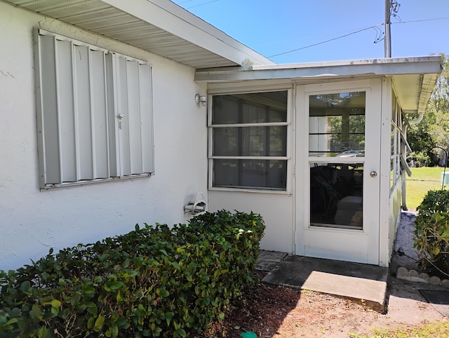 131 Lakes End Dr Unit D, Fort Pierce, FL 34982 - entrance to property with stucco siding