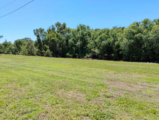 131 Lakes End Dr Unit D, Fort Pierce, FL 34982 - view of green lawn featuring a rural view