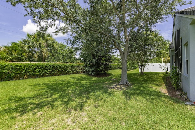 view of yard featuring fence