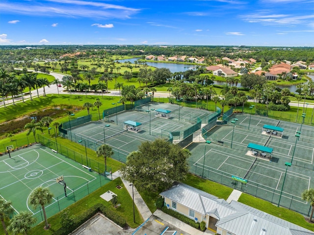 birds eye view of property featuring a residential view and a water view