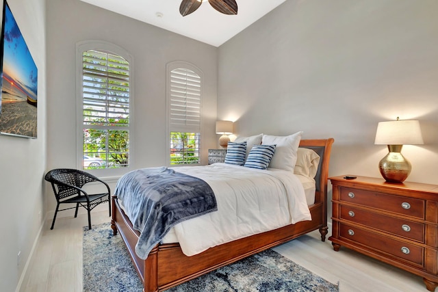 112 Dalena Way, Palm Beach Gardens, FL 33418 - bedroom featuring baseboards, light wood-style flooring, and multiple windows