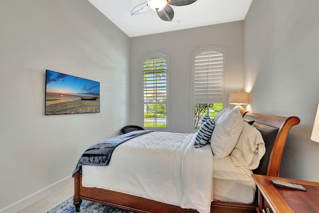 112 Dalena Way, Palm Beach Gardens, FL 33418 - bedroom featuring baseboards, a ceiling fan, and wood finished floors