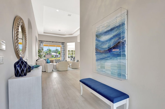 112 Dalena Way, Palm Beach Gardens, FL 33418 - hallway featuring recessed lighting, wood finished floors, and a raised ceiling