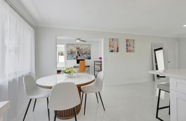 918 Turner Rd, Delray Beach, FL 33483 - dining area with light tile patterned floors and baseboards