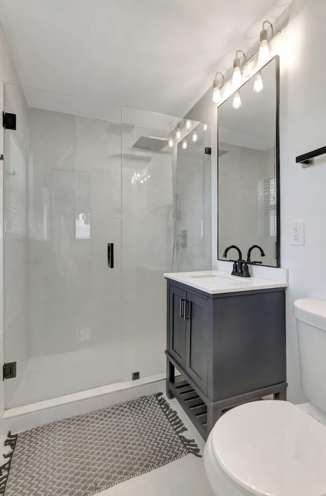 918 Turner Rd, Delray Beach, FL 33483 - bathroom with vanity, a stall shower, and toilet