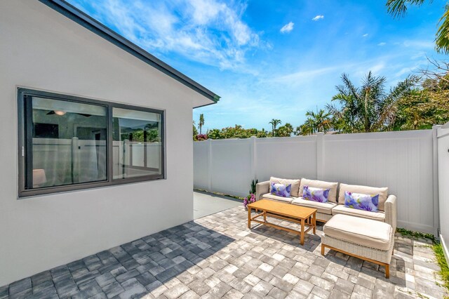 918 Turner Rd, Delray Beach, FL 33483 - view of patio with a fenced backyard and outdoor lounge area