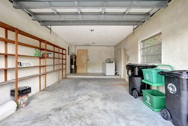 garage with washer / dryer and electric water heater