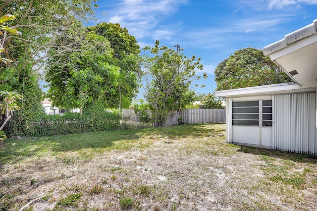 view of yard with fence
