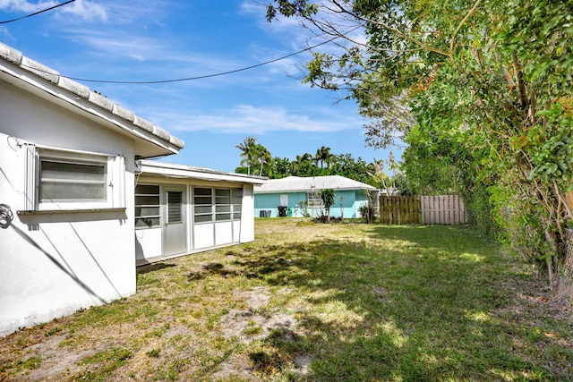 view of yard featuring fence