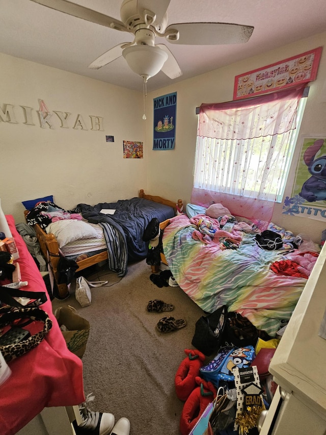 2128 Oakmont Dr Unit 2128, Riviera Beach, FL 33404 - carpeted bedroom featuring ceiling fan