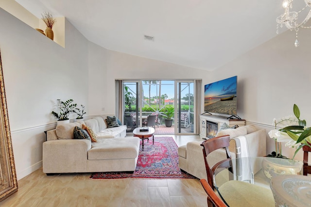 17352 Antigua Point Way, Boca Raton, FL 33487 - living area featuring baseboards, vaulted ceiling, and visible vents