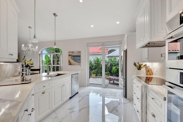 17352 Antigua Point Way, Boca Raton, FL 33487 - kitchen with marble finish floor, recessed lighting, white cabinetry, a sink, and stainless steel appliances