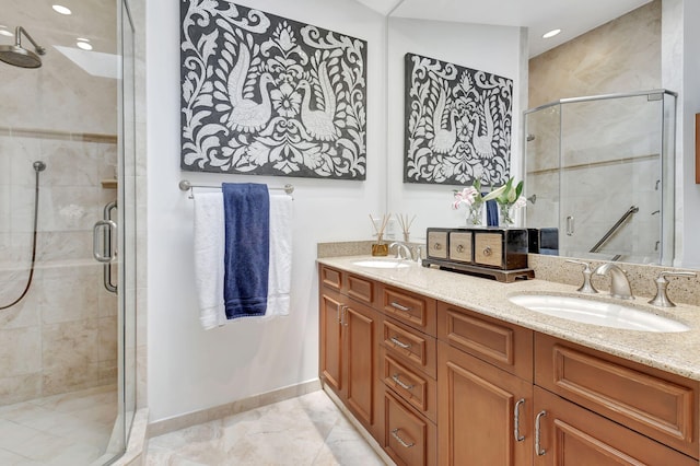 17352 Antigua Point Way, Boca Raton, FL 33487 - bathroom featuring double vanity, a sink, and a stall shower
