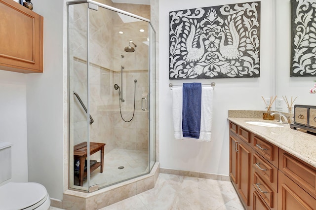 17352 Antigua Point Way, Boca Raton, FL 33487 - bathroom with a stall shower, baseboards, toilet, and vanity
