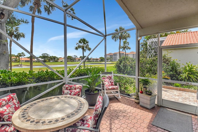 17352 Antigua Point Way, Boca Raton, FL 33487 - sunroom / solarium featuring a water view and view of golf course