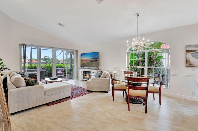 17352 Antigua Point Way, Boca Raton, FL 33487 - living room featuring vaulted ceiling, a wealth of natural light, a notable chandelier, and visible vents