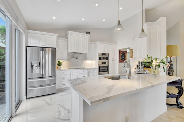17352 Antigua Point Way, Boca Raton, FL 33487 - kitchen with appliances with stainless steel finishes, a sink, a peninsula, lofted ceiling, and white cabinetry