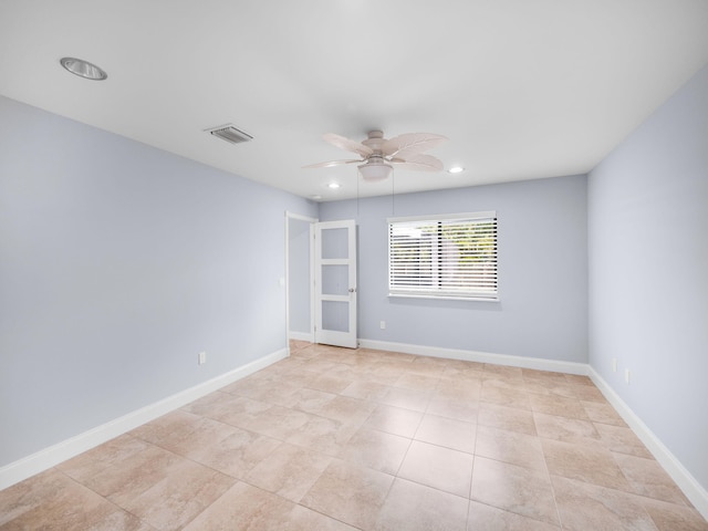 empty room with light tile patterned floors, recessed lighting, a ceiling fan, and visible vents