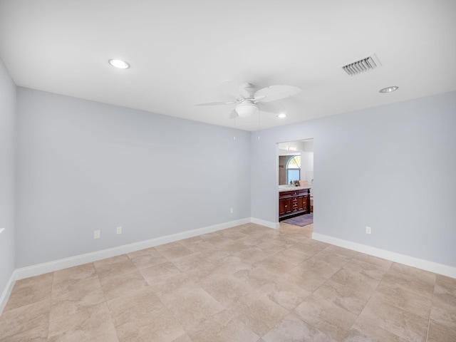spare room featuring ceiling fan, recessed lighting, visible vents, and baseboards