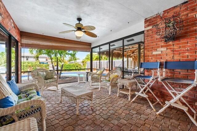 3163 NE 8th Ave, Boca Raton, FL 33431 - sunroom with a ceiling fan and outdoor lounge area