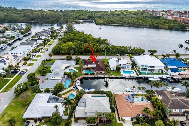 3163 NE 8th Ave, Boca Raton, FL 33431 - aerial view of property and surrounding area with a nearby body of water and nearby suburban area