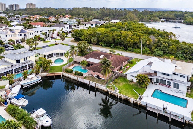 3163 NE 8th Ave, Boca Raton, FL 33431 - aerial view of residential area with a pool and a nearby body of water