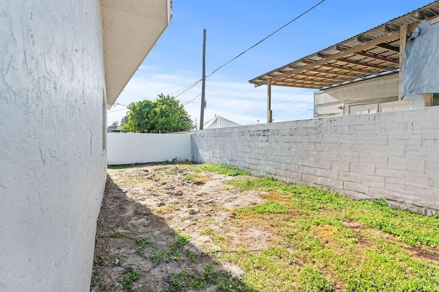 view of yard with fence