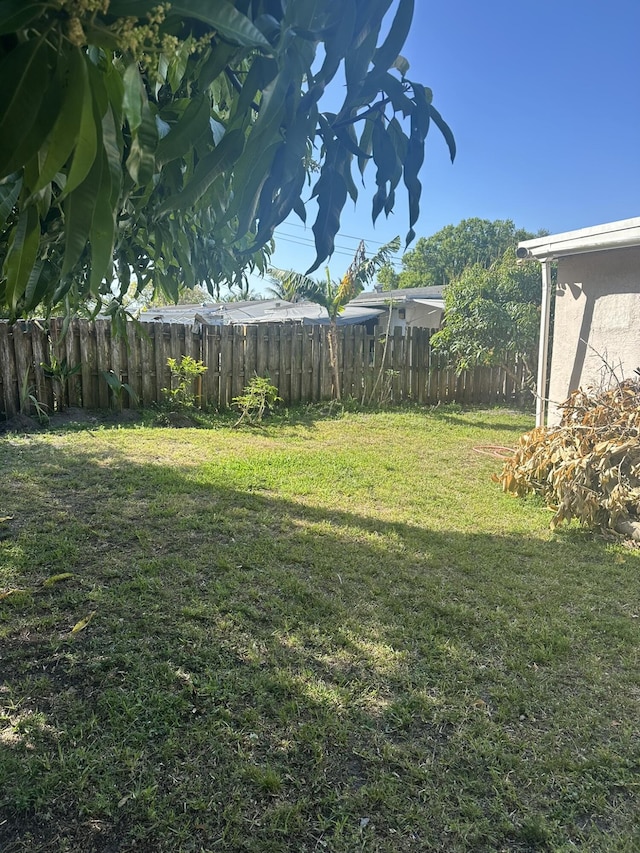 view of yard with fence