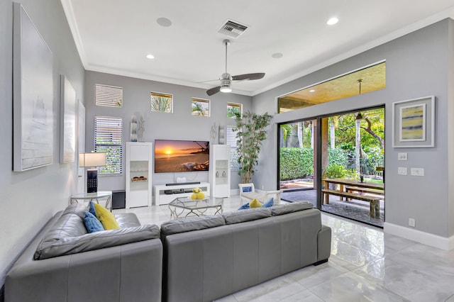 living room with visible vents, ceiling fan, baseboards, ornamental molding, and marble finish floor