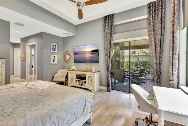 bedroom featuring recessed lighting, access to exterior, light wood finished floors, baseboards, and visible vents