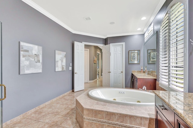 full bath featuring tile patterned flooring, ornamental molding, vanity, visible vents, and a jetted tub