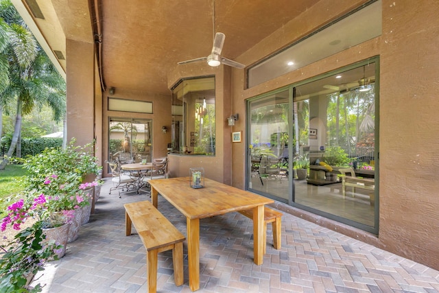 view of patio / terrace with outdoor dining space and ceiling fan