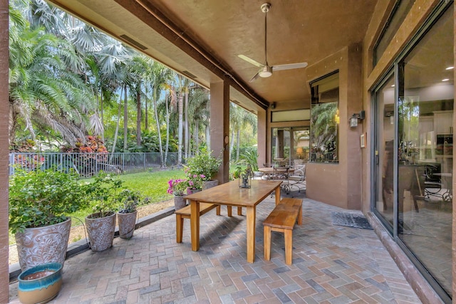 view of patio / terrace with ceiling fan and a fenced backyard