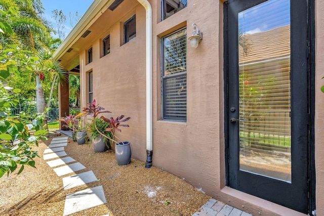 exterior space featuring stucco siding