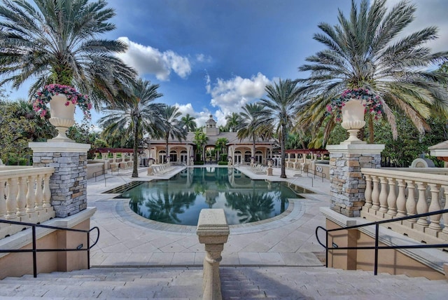 pool with a patio area