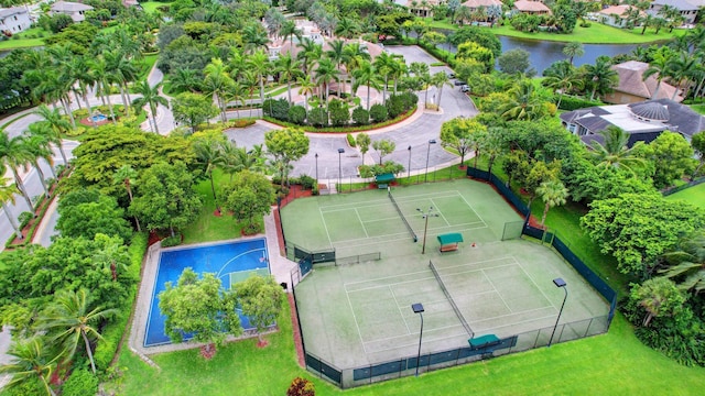 bird's eye view featuring a residential view and a water view