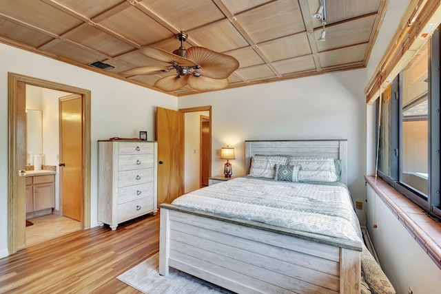 bedroom with wood ceiling, visible vents, ensuite bathroom, light wood-type flooring, and a ceiling fan