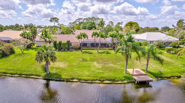 birds eye view of property with a residential view and a water view