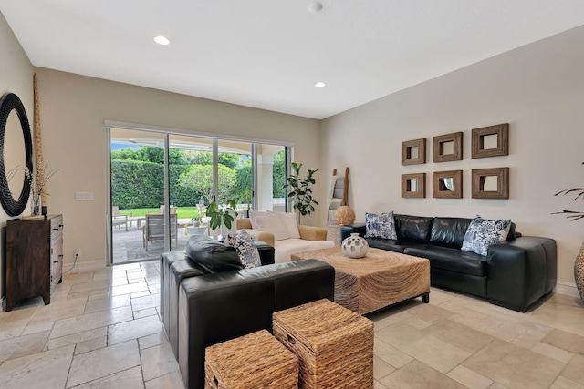 2465 Chesapeake Cir, West Palm Beach, FL 33409 - living room featuring recessed lighting, stone tile floors, and baseboards