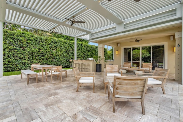 2465 Chesapeake Cir, West Palm Beach, FL 33409 - view of patio featuring a pergola, a ceiling fan, and outdoor dining area