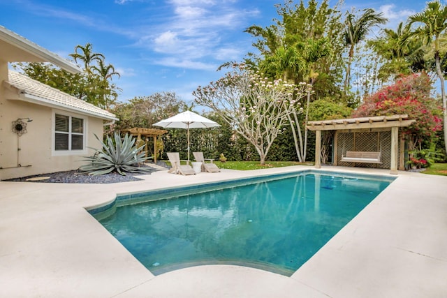2465 Chesapeake Cir, West Palm Beach, FL 33409 - pool featuring a patio area