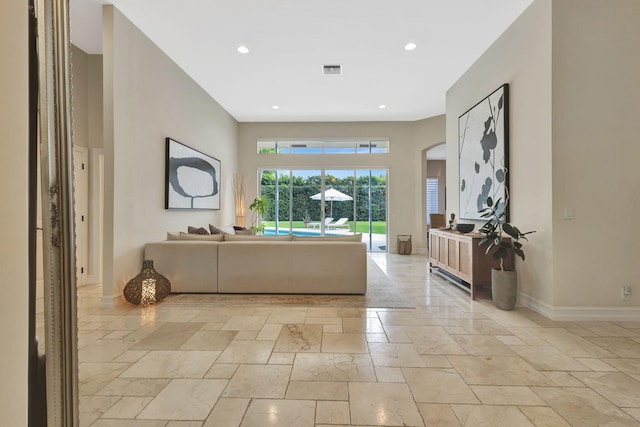 2465 Chesapeake Cir, West Palm Beach, FL 33409 - living area with baseboards, recessed lighting, stone tile flooring, and visible vents