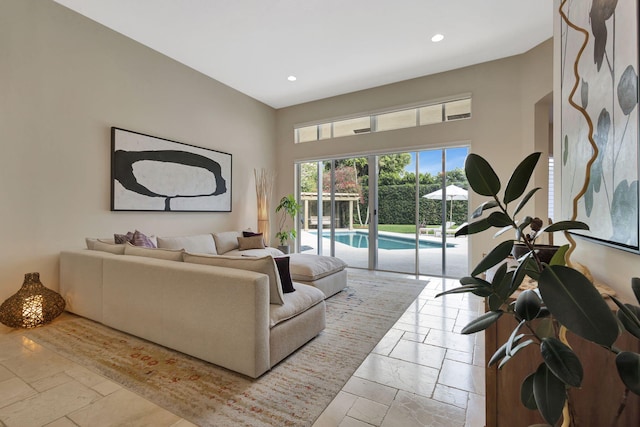 2465 Chesapeake Cir, West Palm Beach, FL 33409 - living room with recessed lighting and stone tile floors