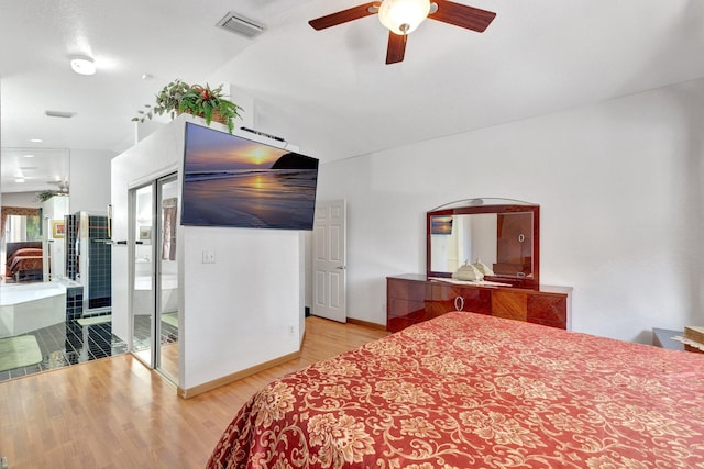 bedroom featuring a ceiling fan, baseboards, visible vents, and light wood-style floors